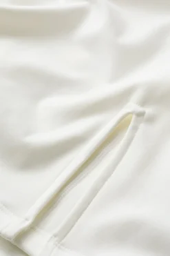 SkinLuxe Asymmetric Side Split Skort - Coconut Milk